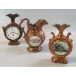 Three 19th century clock faced copper lustre jugs, one marked 'Hope' and other decorated with