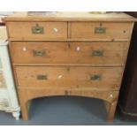 19th century pine campaign style straight front chest of two short and two long drawers with brass