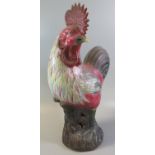 Large Oriental stoneware cockerel in Chinese style with polychrome decoration. 39cm high approx. (