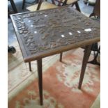 'Arts and Crafts' design oak lamp table, the top carved with fruits and foliage and dated 1898. (B.