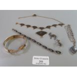 Collection of assorted 'Niello' silver and other costume jewellery items, gilt metal bangle, two