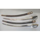 Three Indian Tulwar brass hilted steel bladed ceremonial swords with scabbards. (3) (B.P. 21% + VAT)