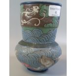 A Japanese style baluster shaped stoneware vase with cylinder neck and incised and painted