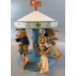 Steiff display carrousel together with six Stieff miniature bears. (B.P. 21% + VAT)