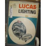 A vintage garage cardboard sign advertising Lucas Lighting. 76 x 50cm approx. (B.P. 21% + VAT)