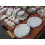 Five trays of Royal Doulton English fine bone china 'Angelique' design dinner and teaware items to