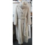 Good quality full length belted platinum mink fur coat with matching hat by Simmons & Fremder Ltd,