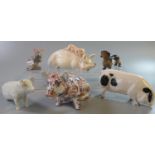 Collection of china and pottery animals, to include: Royal Doulton and Beswick pigs, Japanese seated
