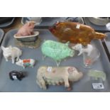A tray of mostly pig ornaments to include; two souvenir ware pigs, hardwood carved pig, carved
