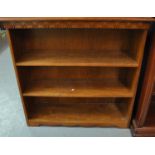 Early 20th century oak free standing open bookcase, having two adjustable shelves. (B.P. 21% + VAT)