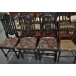 Pair of Victorian stained oak barley twist hall chairs with stylised lion crests, together with