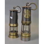 Two vintage miners lamps, one marked Ackroyd & Best Ltd, Morley, Leeds, England. (2) (B.P. 21% +