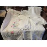 Four good quality vintage linen embroidered tablecloths, two with crochet trim. (4)