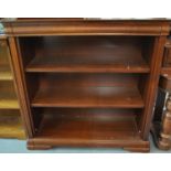 Modern cherry wood open bookcase, having two adjustable shelves. (B.P. 21% + VAT)