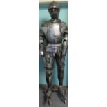 Metal finish theatrical full size model of a knight on metal base with wheels, standing approx 210cm