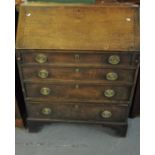 18th century oak fall front bureau having four long long drawers on a projecting base and bracket