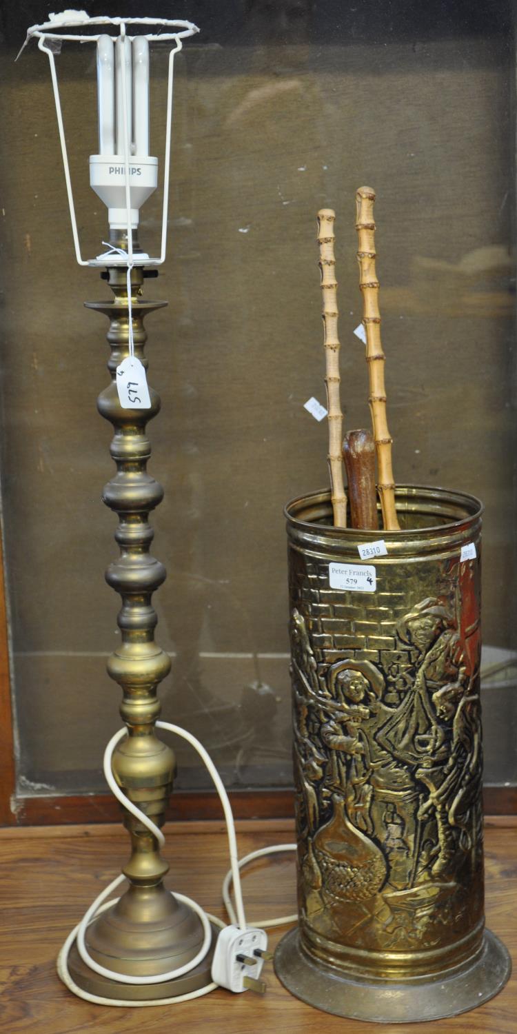 Brass candlestick converted to a table lamp, together with a brass stick stand with assorted