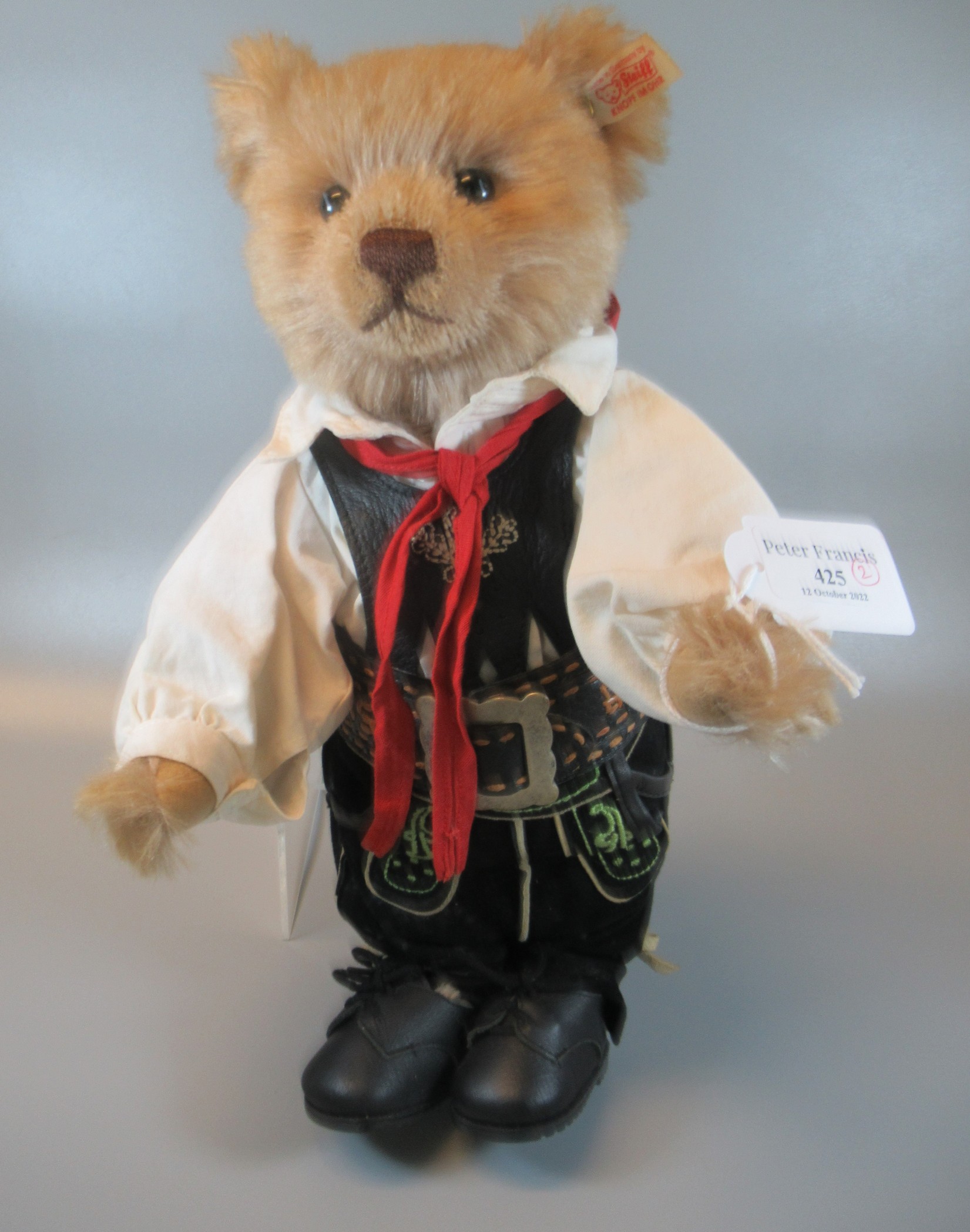 Modern Steiff teddy bear 'Groom', caramel, 34cm dressed in Bavarian costume with box and COA. (B.