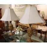 Pair of modern classical design composition urn shaped table lamps with shades, together with a