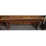 Rustic pine low bench with shaped sides. (B.P. 21% + VAT)