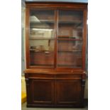Victorian mahogany two stage cabinet back Solicitor's bookcase having serpentine base with two