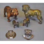 Collection of brass and copper finish bulldog studies, together with a bulldog door knocker and