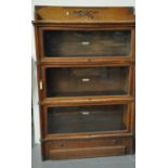 Early 20th century oak 'Globe Wernicke' three sectional bookcase with under drawer, each panel