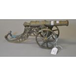 Miniature brass cannon on stand with wheels. (B.P. 21% + VAT)