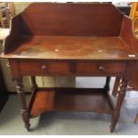 Victorian mahogany wash stand, the moulded back above two drawers with under tier on baluster turned