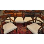 Set of six mahogany Regency style curve and bar back dining chairs with stuff over seats. (4+2) (