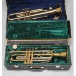 Boosey & Hawkes 400 trumpet in fitted case together with another brass trumpet marked 'Musica