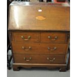 Edwardian mahogany inlaid fall front bureau, having a bank of two short and two long drawers on