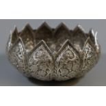 White metal, probably Persian bowl, overall with flowers and foliage. Diameter 12cm approx. 6.