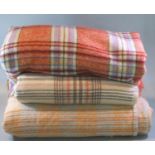 Three vintage woollen check blankets or carthen, in various colourways. (3) (B.P. 21% + VAT)