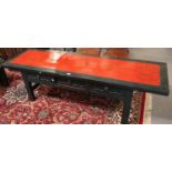 Chinese design painted low alter type table having three drawers on straight rectangular legs. 193cm