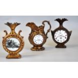 Three 19th century clock faced copper lustre jugs, one marked 'Hope' and other decorated with
