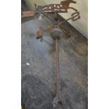 Weathered cast iron weather vane decorated with a horse. (B.P. 21% + VAT)