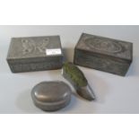 Two pewter embossed cigar boxes decorated with figures and butterflies, together with a Britannia