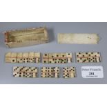 A cased set of bone dominos in a painted bone box with sliding cover. (B.P. 21% + VAT)