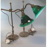 A pair of brass adjustable desk or table lamps with green glass fluted shades. (2) (B.P. 21% + VAT)