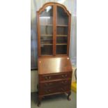 Early 20th century walnut two stage cabinet back bureau bookcase, standing on cabriole legs. (B.P.