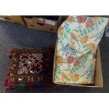 Carpet covered cushion with multi-coloured fringe and a vintage floral quilted bedspread. (2) (B.