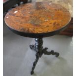 19th century ebonised circular tripod table on barley twist pedestal and shaped feet, the top