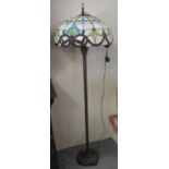 Modern Tiffany style standard lamp, the shape overall with multi coloured floral and foliate