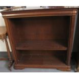 Modern cherry wood open bookcase, having two adjustable shelves. (B.P. 21% + VAT)