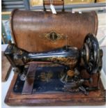 Singer hand sewing machine with bentwood case and instruction leaflet for Nos 127K and 128K. (B.P.