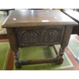 17th century style oak work box, the hinged lid above a carved frieze on turned legs and shaped