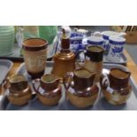 Tray of stoneware to include: Royal Doulton Bell's Scotch whisky decanter, a flagon with raised