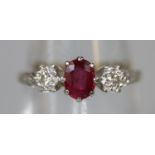 18ct gold ruby and diamond three stone ring. Ring size N. Approx weight 2.1 grams. (B.P. 21% + VAT)