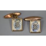 A pair of gilt metal cufflinks. (B.P. 21% + VAT)